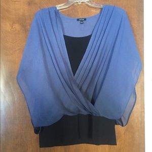 Pretty pants and flowy top.